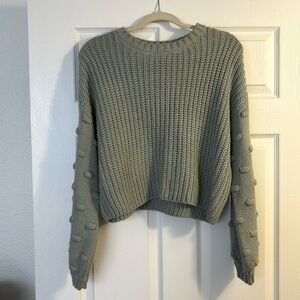 Green multi pattern sweater size small